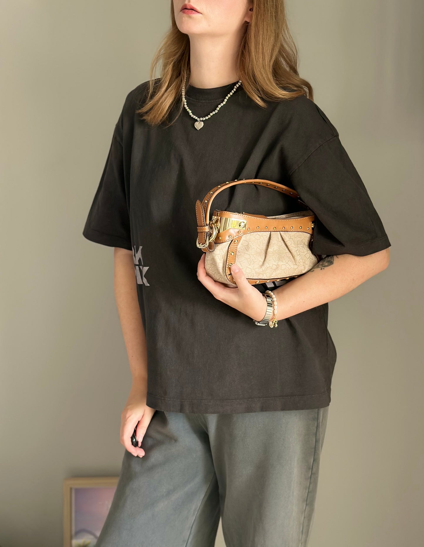 Vintage chic DKNY small bag with edgy details
