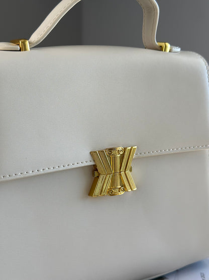Elegant ivory leather handbag from Kassandre