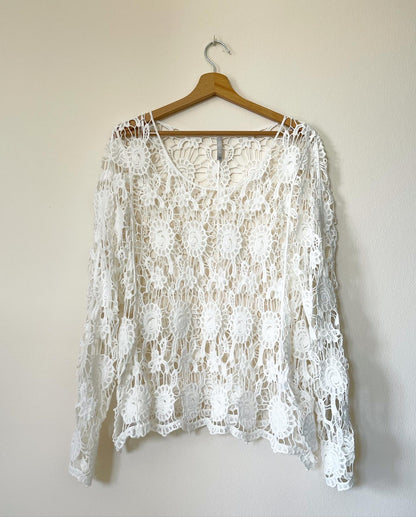 Lovely crochet cotton top in a white color